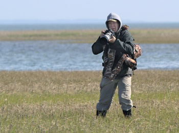 Myself photographing a Tri-colored heron on an island at Shackleford Banks